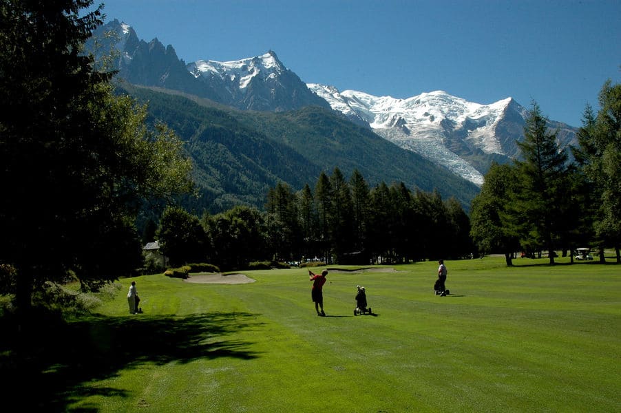 Beyond the Thickets of Trees is Golf Club de Chamonix MontBlanc
